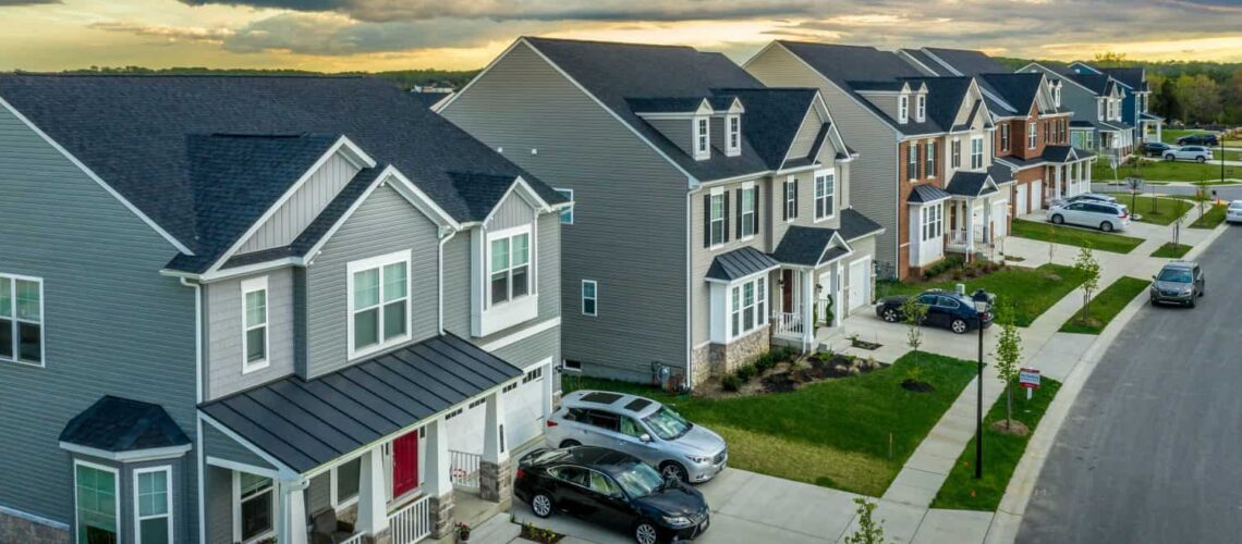 Aerial view of typical American new construction neighborhood street in Maryland for the upper middle class, single family homes USA real estate